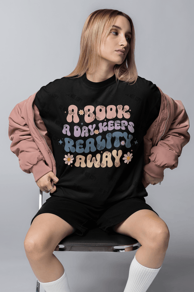 A Book a Day Keeps Reality Away – DTF Transfer for Book Lovers | Whimsical & Fun Design - KT SUBLIMATION, DTF AND MORE LLC