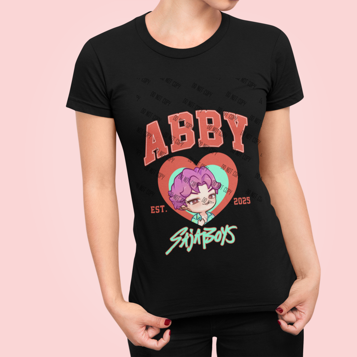Black t-shirt featuring Abby graphic, anime style, with pink heart and 'SajaBoys' text, perfect for anime fans.