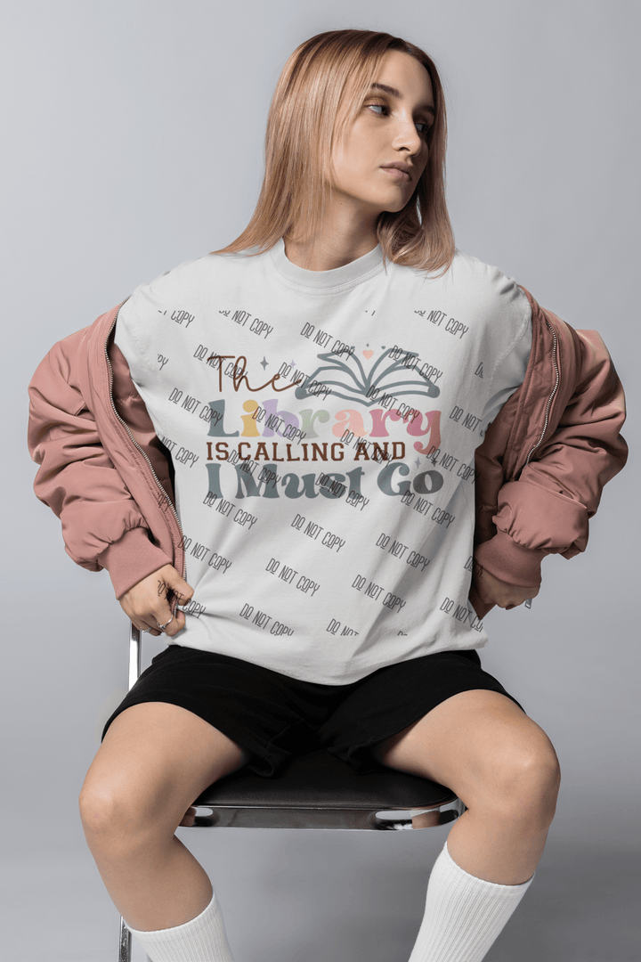 The Library is Calling, I Must Go – DTF Transfer for Book Lovers | Vibrant & Durable Print - KT SUBLIMATION, DTF AND MORE LLC